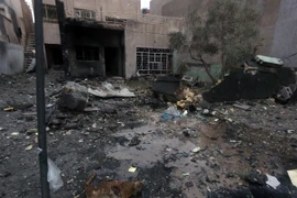 Hiện trường vụ tấn công ở Đông Baghdad ngày 12/1. (Nguồn: AFP/TTXVN)