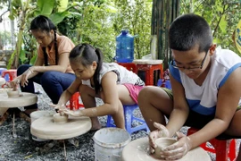 Trẻ em có quyền được vui chơi, học tập. (Ảnh minh họa: Thế Anh/TTXVN)