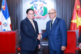 Thủ tướng Phạm Minh Chính hội kiến Chủ tịch Hạ viện Cộng hòa Dominicana Alfredo Pacheco. (Ảnh: Dương Giang/TTXVN)