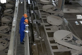 Hoạt động sản xuất tại Nhà Máy Tuyển Quặng Cam đường (Lào Cai) - Công ty TNHH MTV Apatit Việt Nam. (Ảnh: Quốc Khánh/TTXVN)