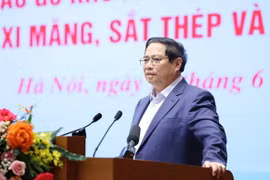 Thủ tướng Phạm Minh Chính phát biểu tại hội nghị thúc đẩy sản xuất, tiêu thụ ximăng, sắt thép và vật liệu xây dựng. (Ảnh: Dương Giang/TTXVN)
