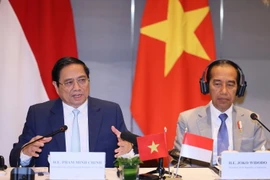 Thủ tướng Phạm Minh Chính và Tổng thống Indonesia Joko Widodo chủ trì Đối thoại doanh nghiệp cấp cao Việt Nam-Indonesia. (Ảnh: Dương Giang/TTXVN)