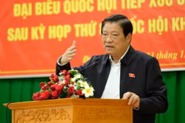 Ông Phan Đình Trạc, Ủy viên Bộ Chính trị, Bí thư Trung ương Đảng, Trưởng Ban Nội chính Trung ương phát biểu kết luận buổi tiếp xúc cử tri. (Ảnh: Nguyễn Dũng/TTXVN)