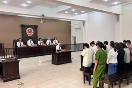 Các bị cáo mua bán người trong một vụ án xét xử. (Nguồn: TTXVN)