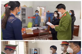 Tống đạt quyết định khởi tố đối với 2 bị can Lê Minh Tâm và Phạm Thị Thanh Thủy. (Nguồn: baonghean.vn)