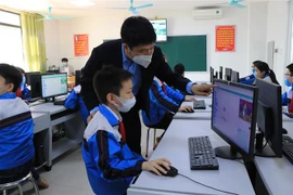 Học sinh trường Tiểu học Suối Hoa (thành phố Bắc Ninh). (Ảnh: Thái Hùng/TTXVN)