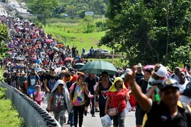 Người di cư trong hành trình tới Mỹ tại Huixtla, bang Chiapas, Mexico, ngày 27/10/2021. (Ảnh: AFP/ TTXVN)