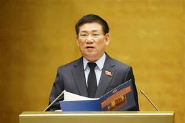 Tổng Kiểm toán Nhà nước Hồ Đức Phớc trình bày Tờ trình về dự án Luật sửa đổi, bổ sung một số điều của Luật Kiểm toán Nhà nước. (Ảnh: Doãn Tấn/TTXVN)