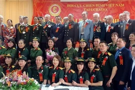 Các đại biểu chụp ảnh lưu niệm. (Ảnh: TTXVN phát)