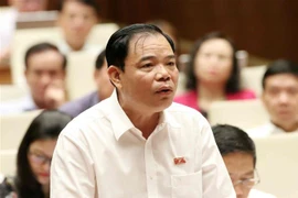Bộ trưởng Bộ Nông nghiệp và Phát triển Nông thôn Nguyễn Xuân Cường, đại biểu Quốc hội tỉnh Bắc Kạn phát biểu. (Ảnh: Văn Điệp/TTXVN)