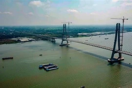 Cầu Vàm Cống bắc qua sông Hậu nối huyện Lấp Vò (Đồng Tháp) với quận Thốt Nốt (thành phố Cần Thơ). (Ảnh: TTXVN phát)