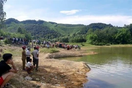 Đập nước hiện trường xảy ra vụ đuối nước của năm em học sinh. (Ảnh: TTXVN phát)