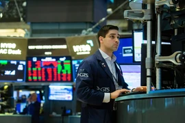 Chứng khoán Âu-Mỹ đồng loạt đi xuống sau quyết định của ECB