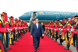 Thủ tướng Nguyễn Tấn Dũng tới thành phố Busan của Hàn Quốc