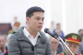 Bị cáo Nguyễn Quang Thành, cựu Giám đốc Công ty trách nhiệm hữu hạn Minh Hưng Phát, khai báo trước Hội đồng xét xử. (Ảnh: Doãn Tấn/TTXVN)