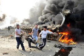 Hiện trường một vụ đánh bom kép tại Damascus. (Nguồn: AFP/TTXVN)