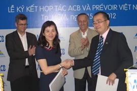 Quang cảnh lễ ký kết. (Ảnh: Hà Huy Hiệp/Vietnam+)