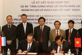 Quang cảnh lễ ký kết. (Ảnh: Nhật Anh/TTXVN)