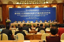 Ông Đinh Thế Huynh phát biểu tại hội thảo. (Ảnh: Quang Đức/TTXVN)