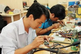 Phòng nghiên cứu, thiết kế vi mạch tại ICDREC, Đại học Quốc gia Thành phố Hồ Chí Minh. (Ảnh: Mạnh Linh/TTXVN)