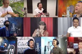 Các nghệ sỹ tham gia MV “Việt Nam ơi, cùng nhau đồng lòng.” (Ảnh: PV/Vietnam+) 