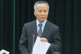 Thứ trưởng Bộ Công Thương Trần Quốc Khánh đang giải thích về TPP (Ảnh: Đức Duy/Vietnam+)