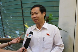 Đại biểu Quốc hội Nguyễn Thái Học, đang trả lời báo chí (Ảnh: Đức Duy/Vietnam+)