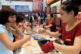 Điều chỉnh theo thế giới, giá vàng SJC xuống sát 35 triệu đồng 