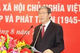 Trưởng ban Tuyên giáo Trương ương Đinh Thế Huynh phát biểu tại Hội thảo. (Ảnh: An Đăng/TTXVN)