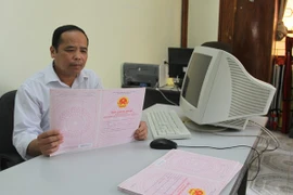 Yêu cầu các địa phương đẩy nhanh tiến độ cấp đổi sổ đỏ 