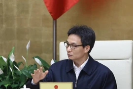 Phó Thủ tướng Vũ Đức Đam chủ trì cuộc họp. (Ảnh: Văn Điệp/TTXVN)