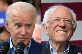Cựu Phó Tổng thống Mỹ Joe Biden (trái) và ứng viên tranh cử tự do, Thượng nghị sỹ Bernie Sanders. (Ảnh: AFP/TTXVN)