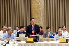 Ông Dương Quang Thành, Chủ tịch Hội đồng thành viên Tập đoàn Điện lực Việt Nam (EVN), đại diện Khối doanh nghiệp Nhà nước phát biểu. (Ảnh: Thống Nhất/TTXVN)