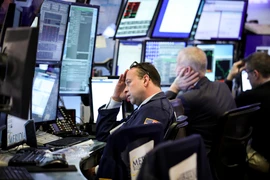 Giao dịch viên tại Sàn giao dịch chứng khoán New York, Mỹ, ngày 9/3/2020. (Ảnh: THX/TTXVN)