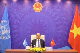 Thủ tướng Chính phủ Nguyễn Xuân Phúc phát biểu tại điểm cầu Hà Nội. (Ảnh: Thống Nhất/TTXVN)