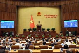 Quốc hội biểu quyết thông qua Luật Trật tự, an toàn giao thông đường bộ. (Ảnh: An Đăng/TTXVN)