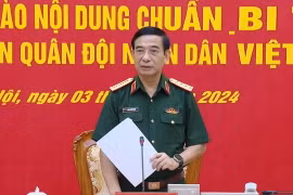 Đại tướng Phan Văn Giang, Ủy viên Bộ Chính trị, Phó Bí thư Quân ủy Trung ương, Bộ trưởng Bộ Quốc phòng, phát biểu tại Hội nghị. (Ảnh: Hồng Pha/TTXVN phát)