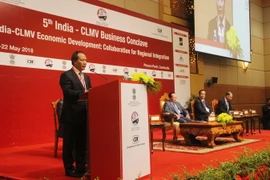 Thứ trưởng Bộ Công thương Cao Quốc Hưng phát biểu tại hội nghị. (Ảnh: Minh Hưng-Chanh Đa/TTXVN)