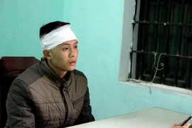 Đối tượng Đặng Văn Hòa tại cơ quan điều tra. (Ảnh: Quang Cường/TTXVN)