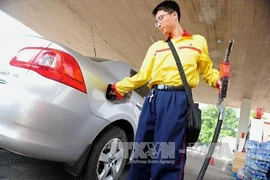 Tại một trạm bán xăng ở Trường Xuân, thủ phủ tỉnh Cát Lâm, miền đông bắc Trung Quốc. (Ảnh: THX/TTXVN)