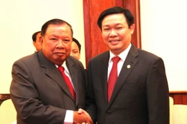 Việt-Lào chia sẻ kinh nghiệm về chiến lược phát triển kinh tế