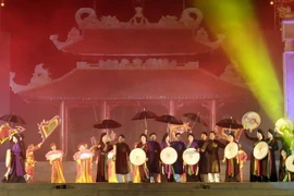 Chương trình nghệ thuật Văn hiến Bắc Ninh - Hội tụ và toả sáng trong đêm khai mạcFestival Bắc Ninh 2010. (Ảnh: Thanh Hà/TTXVN)