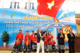 Lẽ xuất quân của đoàn thể thao người khuyết tật (Nguồn: TTXVN)