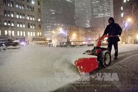 Tuyết ngập đường phố tại hạ Manhattan ngày 2/1. (Nguồn: AFP/TTXVN)