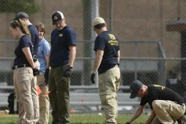 Cảnh sát điều tra tại hiện trường vụ tấn công. (Nguồn: AFP/TTXVN)