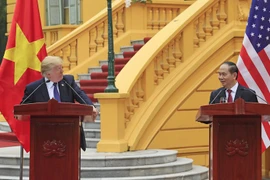 Chủ tịch nước Trần Đại Quang và Tổng thống Hoa Kỳ Donald Trump tại cuộc họp báo quốc tế, sau khi kết thúc hội đàm. (Ảnh: Nhan Sáng/TTXVN)