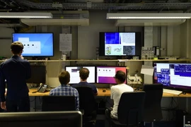 Nhân viên làm việc tại văn phòng ở Hamburg, Đức ngày 1/9. (Nguồn: AFP/TTXVN)