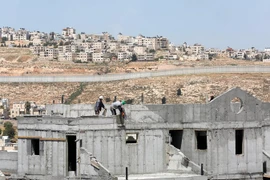 Công trường xây dựng khu định cư ở thành phố Bờ Tây Ramallah ngày 19/4. (Nguồn: EPA/TTXVN)