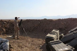 Các lực lượng ủng hộ Chính phủ Syria trong chiến dịch giải phóng vùng núi phía tây Qalamoun từ phiến quân IS ngày 19/8. (Nguồn: AFP/TTXVN)