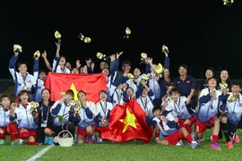 [Photo] Tuyển bóng đá nữ Việt Nam tận hưởng khoảnh khắc chiến thắng